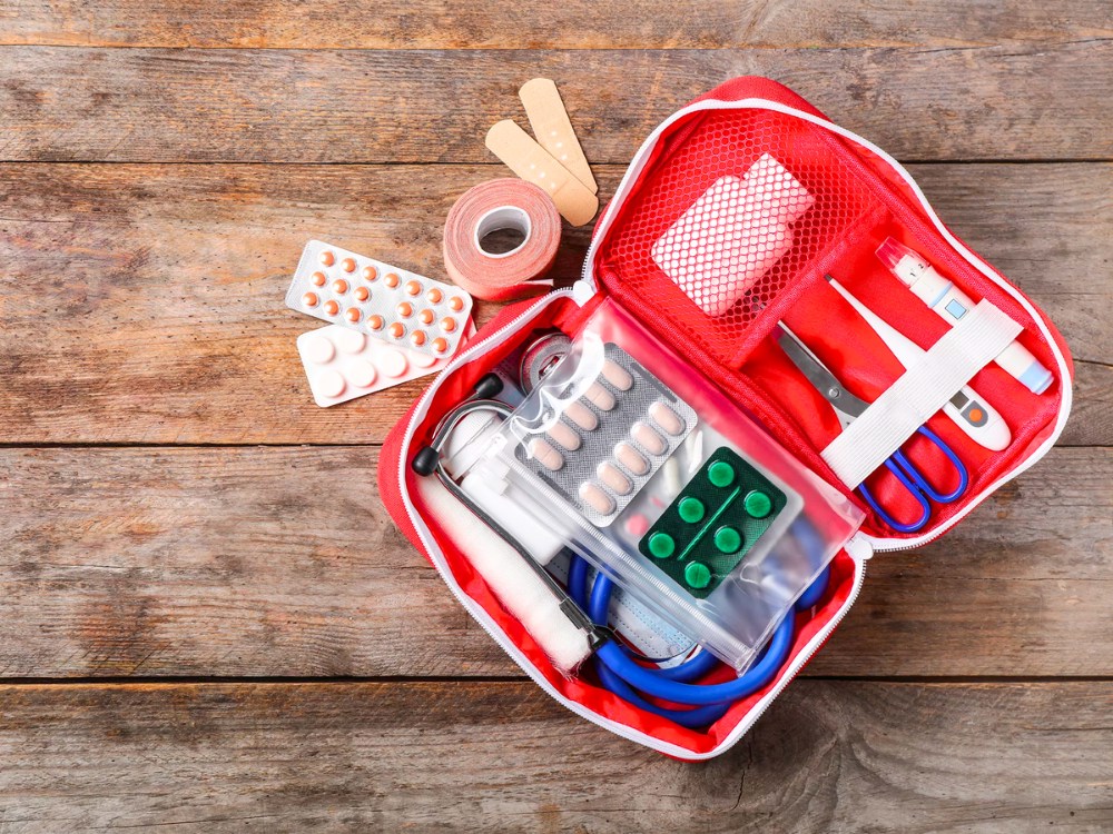 Travel first-aid kit with essential medication for a trip to Vietnam