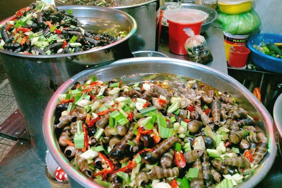Oc hut escargots sautes citronnelle piment cuisine de rue Da Nang